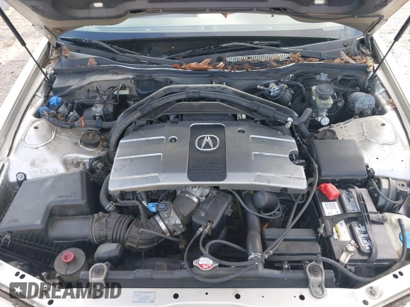 2004 Acura RL w/Navigation System z VIN JH4KA96664C001291, wystawiony jako IAAI lot #41678449 z przebiegiem 83 954 mil mil oraz . Historia ofert i sprzedaży dostępna na DreamBid. Obrazek 10.