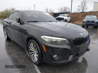 2014 BMW 2 Series 228i with VIN WBA1F5C57EV256067, listed as a IAAI auction lot 41283608 with 108,128 mi miles and . Bid and sale history available at carsss.com. Image 1.