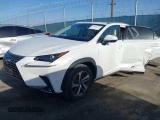 2021 Lexus NX with VIN JTJGARBZXM5023867, listed as a IAAI auction lot 41916734 with 26,675 mi miles. Bid and sale history available at carsss.com. Image 2.