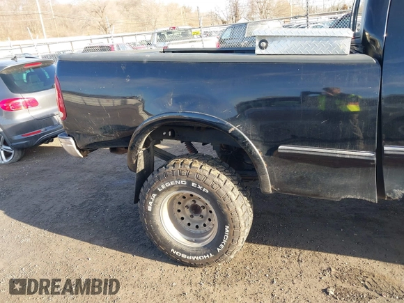 1997 Ford F-150 XL with VIN 1FTDX18W7VKC26527, listed as a IAAI auction lot 41692112 with 187,720 mi miles. Bid and sale history available at carsss.com. Image 6.