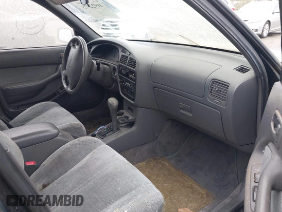1994 Toyota Camry LE z VIN JT2GK12E1R0036423, wystawiony jako IAAI lot #41922375 z przebiegiem 211 529 mil mil oraz . Historia ofert i sprzedaży dostępna na DreamBid. Obrazek 5.