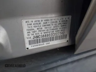 2002 Honda Accord SE z VIN JHMCG66802C027742, wystawiony jako IAAI lot #42373110 z przebiegiem 141 167 mil mil oraz . Historia ofert i sprzedaży dostępna na DreamBid. Obrazek 9.