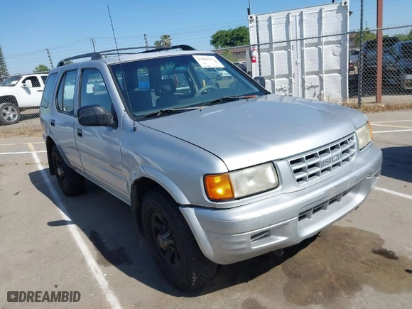 1998 Isuzu Rodeo S with VIN 4S2CM58WXW4325350, listed as a IAAI auction lot 42084411 with 292,784 mi miles. Bid and sale history available at carsss.com. Image 1.