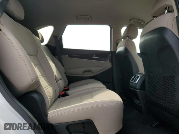 2018 Kia Sorento L z VIN 5XYPG4A35JG342050, wystawiony jako Copart lot #54517715 z przebiegiem 121 415 mil mil oraz Szkoda całkowita • Salvage title. Historia ofert i sprzedaży dostępna na DreamBid. Obrazek 11.