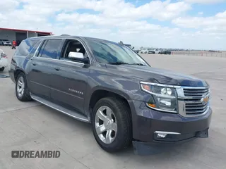 2015 Chevrolet Suburban LTZ with VIN 1GNSCKKC9FR500933, listed as a IAAI auction lot 41830980 with 169,217 mi miles and . Bid and sale history available at DreamBid. Image 1.