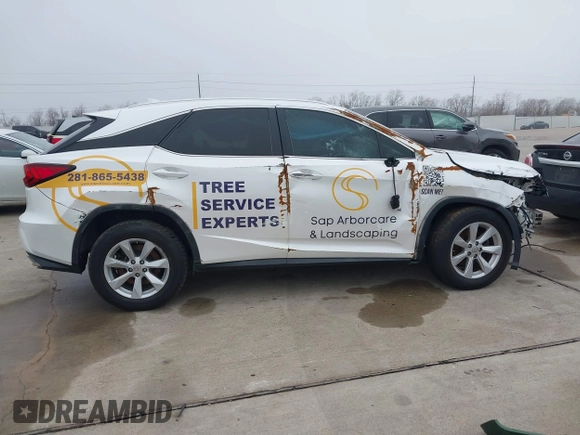 2016 Lexus RX 350 with VIN 2T2BZMCA5GC032156, listed as a IAAI auction lot 41623595 with 133,103 mi miles and . Bid and sale history available at DreamBid. Image 12.