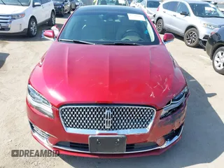2019 Lincoln MKZ Hybrid Reserve II with VIN 3LN6L5MU7KR617325, listed as a IAAI auction lot 42584481 with 76,118 mi miles and . Bid and sale history available at DreamBid. Image 12.