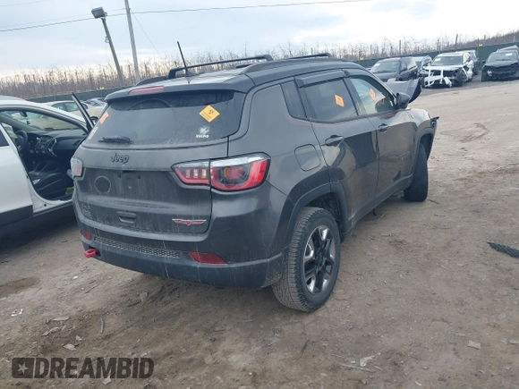 2017 Jeep Compass Trailhawk with VIN 3C4NJDDBXHT630533, listed as a IAAI auction lot 41668105 with 37,036 mi miles and . Bid and sale history available at DreamBid. Image 4.