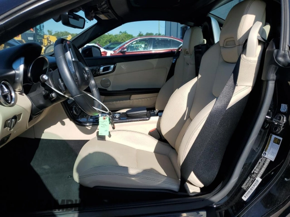 2016 Mercedes-Benz SLK 300 with VIN WDDPK3JA2GF116010, listed as a Copart auction lot 53299315 with 50,295 mi miles and Salvage Title. Bid and sale history available at DreamBid. Image 7.