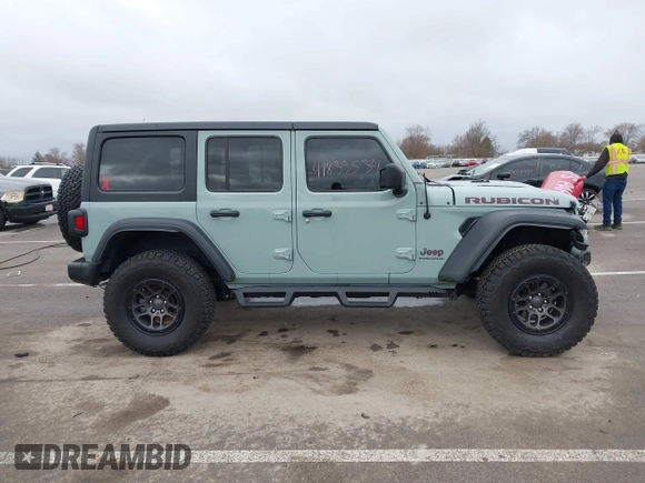 2023 Jeep Wrangler Rubicon with VIN 1C4JJXFG7PW654564, listed as a IAAI auction lot 41833534 with 22,277 mi miles and . Bid and sale history available at DreamBid. Image 13.