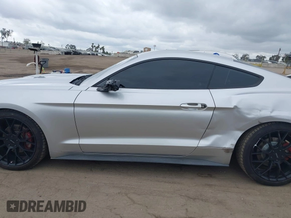 2015 Ford Mustang V6 with VIN 1FA6P8AM2F5370342, listed as a IAAI auction lot 42065605 with 141,569 mi miles and . Bid and sale history available at DreamBid. Image 14.