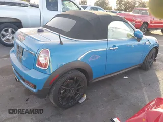 2013 MINI Roadster S z VIN WMWSY3C55DT594628, wystawiony jako IAAI lot #41316950 z przebiegiem 77 399 mil mil oraz . Historia ofert i sprzedaży dostępna na DreamBid. Obrazek 4.
