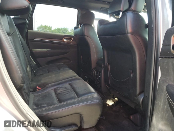 2014 Jeep Grand Cherokee Limited z VIN 1C4RJFBG2EC565910, wystawiony jako Copart lot #57918225 z przebiegiem Nie podano mil oraz Czysty tytuł • Clean title. Historia ofert i sprzedaży dostępna na DreamBid. Obrazek 11.
