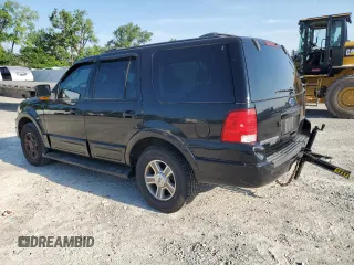 2004 Ford Expedition Eddie Bauer with VIN 1FMPU18L74LB29764, listed as a Copart auction lot 60397795 with 163,593 mi miles and Salvage title. Bid and sale history available at DreamBid. Image 2.