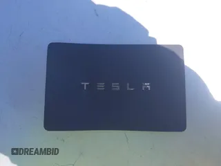 2020 Tesla Model Y Long Range with VIN 5YJYGDEE2LF059177, listed as a IAAI auction lot 41916260 with 66,190 mi miles and . Bid and sale history available at DreamBid. Image 11.