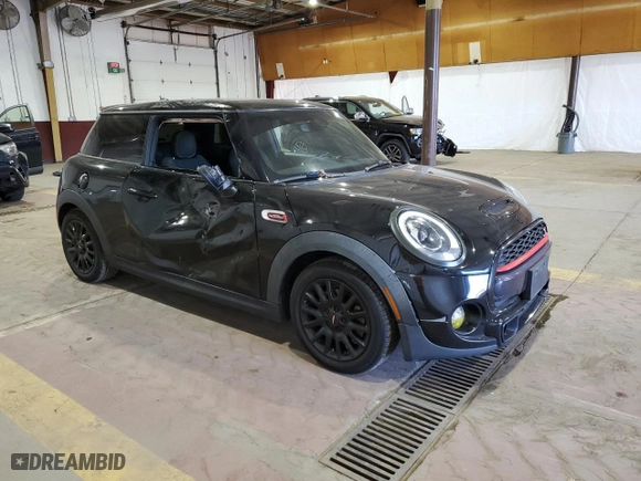 2016 MINI Cooper Hardtop S with VIN WMWXP7C58G3B49825, listed as a Copart auction lot 70988364 with 106,474 mi miles and Salvage Title. Bid and sale history available at carsss.com. Image 4.