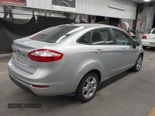 2015 Ford Fiesta SE with VIN 3FADP4BJXFM133631, listed as a IAAI auction lot 41835888 with 51,562 mi miles. Bid and sale history available at carsss.com. Image 4.