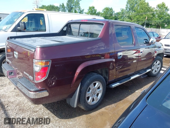 2007 Honda Ridgeline RTL with VIN 2HJYK16587H518901, listed as a IAAI auction lot 42762425 with 206,243 mi miles and . Bid and sale history available at DreamBid. Image 4.