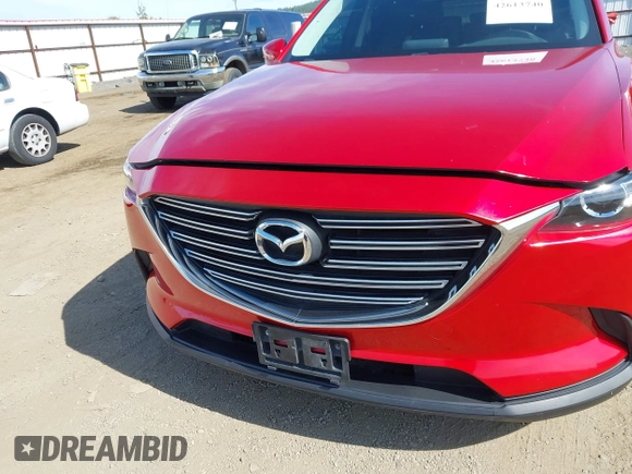 2016 Mazda CX-9 Touring z VIN JM3TCACY9G0122174, wystawiony jako IAAI lot #42613740 z przebiegiem 148 646 mil mil oraz . Historia ofert i sprzedaży dostępna na DreamBid. Obrazek 6.