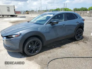 2025 Mazda CX-30 S Carbon Edition z VIN 3MVDMBCM5SM766787, wystawiony jako Copart lot #58407845 z przebiegiem 10 369 mil mil oraz Czysty tytuł • Clean title. Historia ofert i sprzedaży dostępna na DreamBid. Obrazek 1.
