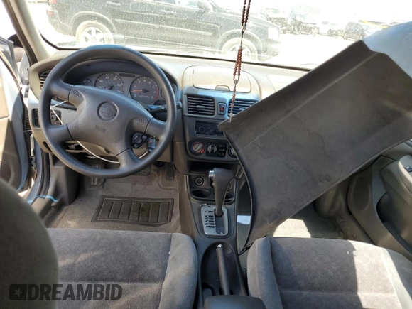 2000 Nissan Sentra XE with VIN 3N1CB51DXYL353188, listed as a Copart auction lot 56490115 with 190,643 mi miles and Salvage title. Bid and sale history available at DreamBid. Image 8.
