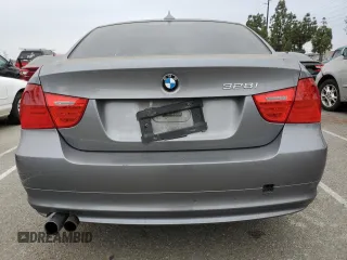 2010 BMW 3 Series 328i with VIN WBAPH5G51ANM36203, listed as a Copart auction lot 57349235 with 183,491 mi miles and Salvage title. Bid and sale history available at DreamBid. Image 6.