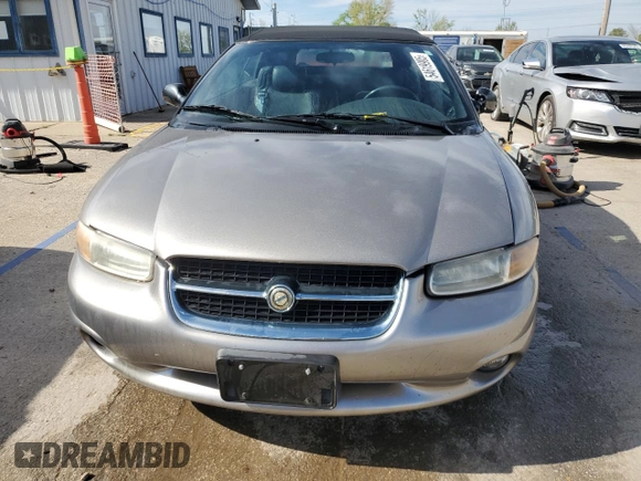 1998 Chrysler Sebring JXi z VIN 3C3EL55H7WT202665, wystawiony jako Copart lot #54619905 z przebiegiem 36 351 mil mil oraz Szkody całkowita. Historia ofert i sprzedaży dostępna na DreamBid. Obrazek 5.