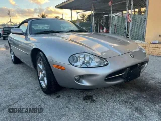 1999 Jaguar XK with VIN SAJGX204XXC041660, listed as a Copart auction lot 88755785 with 70,091 mi miles and Clean Title. Bid and sale history available at DreamBid. Image 1.