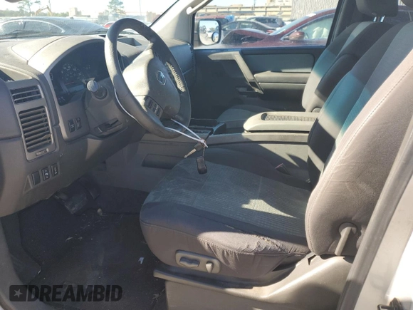 2005 Nissan Titan SE z VIN 1N6AA06AX5N500773, wystawiony jako Copart lot #81695634 z przebiegiem 127 210 mil mil oraz Szkoda całkowita • Salvage title. Historia ofert i sprzedaży dostępna na DreamBid. Obrazek 7.