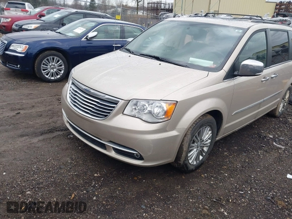2016 Chrysler Town & Country Touring z VIN 2C4RC1CG5GR166771, wystawiony jako IAAI lot #41715807 z przebiegiem 121 652 mil mil oraz . Historia ofert i sprzedaży dostępna na DreamBid. Obrazek 2.