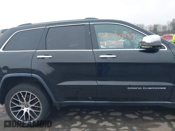 2014 Jeep Grand Cherokee Limited z VIN 1C4RJFBG0EC195654, wystawiony jako IAAI lot #42090257 z przebiegiem 195 615 mil mil oraz . Historia ofert i sprzedaży dostępna na DreamBid. Obrazek 13.