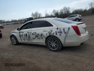 2013 Cadillac XTS Platinum z VIN 2G61V5S38D9204439, wystawiony jako Copart lot #53886495 z przebiegiem 89 940 mil mil oraz Szkody całkowita. Historia ofert i sprzedaży dostępna na DreamBid. Obrazek 2.