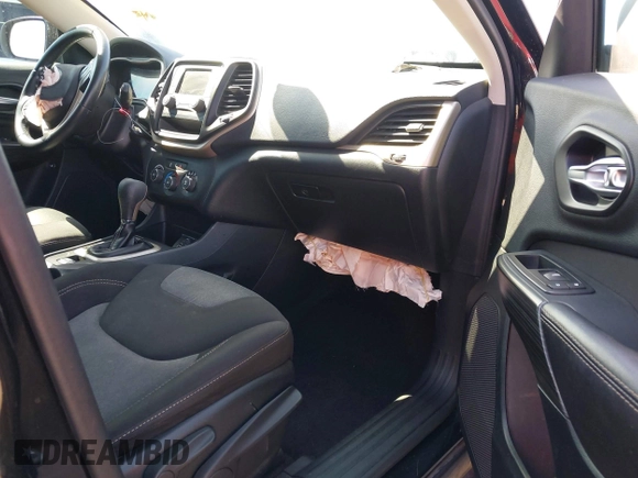 2016 Jeep Cherokee Altitude with VIN 1C4PJLAB2GW329397, listed as a IAAI auction lot 42294033 with 96,812 mi miles and . Bid and sale history available at DreamBid. Image 5.