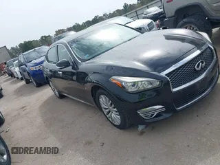 2015 Infiniti Q70 with VIN JN1BY1PP9FM601468, listed as a IAAI auction lot 41745618 with 138,932 mi miles and . Bid and sale history available at DreamBid. Image 1.