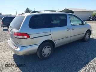 2003 Toyota Sienna LE with VIN 4T3ZF13C83U550595, listed as a IAAI auction lot 42109391 with 195,592 mi miles. Bid and sale history available at carsss.com. Image 4.