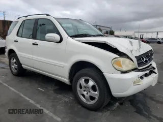 2004 Mercedes-Benz M-Class 3.5L with VIN 4JGAB57E74A501184, listed as a Copart auction lot 77801184 with 0 mi miles and Salvage Title. Bid and sale history available at carsss.com. Image 4.