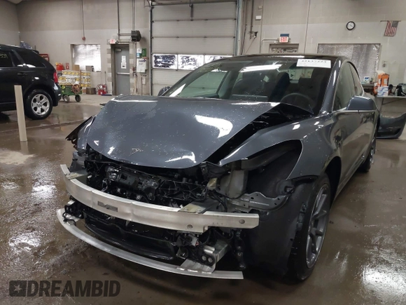 2020 Tesla Model 3 Long Range z VIN 5YJ3E1EB0LF800804, wystawiony jako IAAI lot #42137223 z przebiegiem 52 482 mil mil oraz . Historia ofert i sprzedaży dostępna na DreamBid. Obrazek 6.