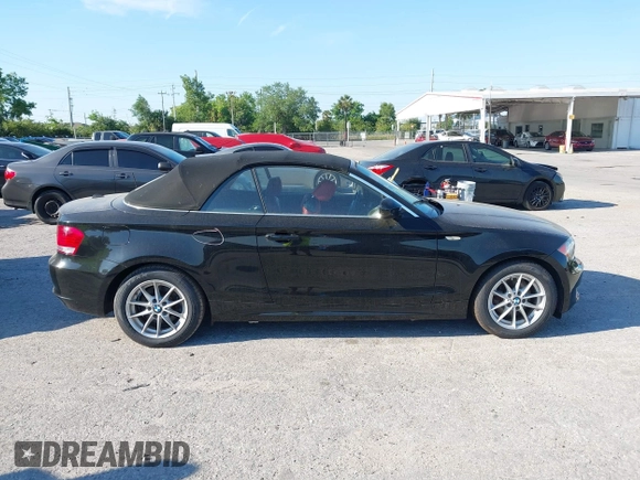 2011 BMW 1 Series 128i with VIN WBAUL7C55BVM81049, listed as a IAAI auction lot 41892811 with 50,659 mi miles and . Bid and sale history available at carsss.com. Image 14.