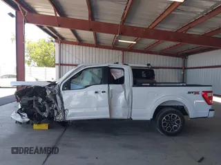 2023 Ford F-150 XL with VIN 1FTEX1CP1PKE18310, listed as a IAAI auction lot 42337133 with 26,931 mi miles and . Bid and sale history available at DreamBid. Image 14.