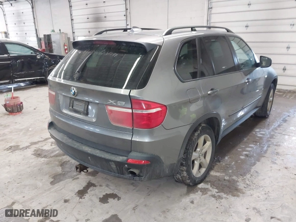 2009 BMW X5 30i with VIN 5UXFE43559L272922, listed as a IAAI auction lot 41723504 with 210,793 mi miles. Bid and sale history available at carsss.com. Image 4.