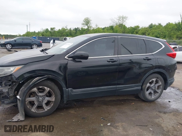 2017 Honda CR-V EX with VIN 7FARW1H59HE007171, listed as a IAAI auction lot 42033941 with 134,227 mi miles and . Bid and sale history available at DreamBid. Image 14.