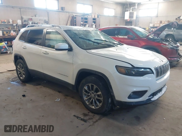 2020 Jeep Cherokee Altitude with VIN 1C4PJMLN6LD647106, listed as a IAAI auction lot 41406440 with 58,788 mi miles. Bid and sale history available at carsss.com. Image 1.