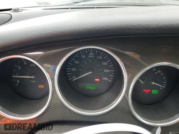 2006 Jaguar XK with VIN SAJDA42C462A44968, listed as a Copart auction lot 75758524 with 77,266 mi miles and Salvage Title. Bid and sale history available at carsss.com. Image 9.