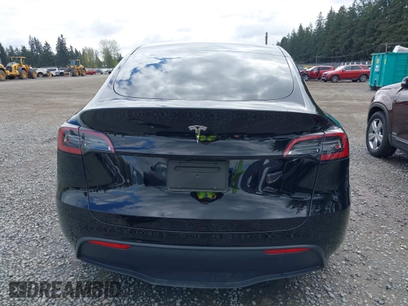 2024 Tesla Model Y with VIN 7SAYGDED3RF119101, listed as a IAAI auction lot 42019817 with 35,714 mi miles and . Bid and sale history available at DreamBid. Image 16.