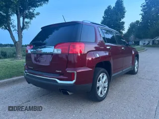 2017 GMC Terrain SLT z VIN 2GKFLUE34H6192039, wystawiony jako Copart lot #60246395 z przebiegiem 146 486 mil mil oraz Czysty tytuł • Clean title. Historia ofert i sprzedaży dostępna na DreamBid. Obrazek 4.