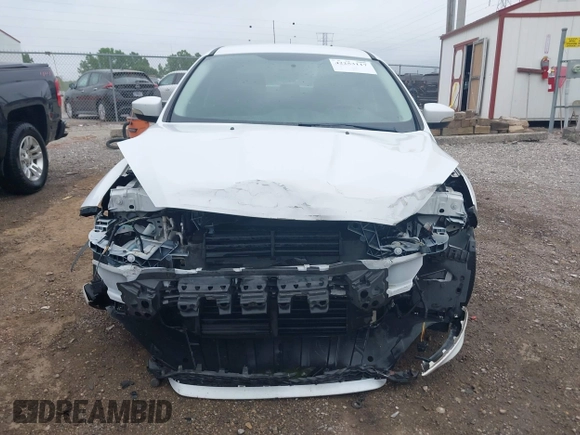 2016 Ford Focus SE with VIN 1FADP3F21GL288553, listed as a IAAI auction lot 42253117 with 107,727 mi miles and . Bid and sale history available at DreamBid. Image 13.