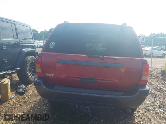 2004 Jeep Grand Cherokee Laredo with VIN 1J4GW48S34C419596, listed as a IAAI auction lot 42515494 with 276,196 mi miles and . Bid and sale history available at DreamBid. Image 16.