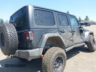 2018 Jeep Wrangler Unlimited Sport S with VIN 1C4HJXDN1JW216825, listed as a IAAI auction lot 42405799 with 37,194 mi miles and . Bid and sale history available at DreamBid. Image 4.