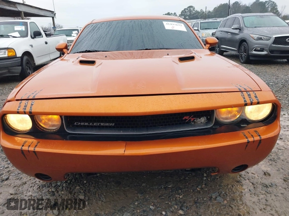 2011 Dodge Challenger z VIN 2B3CJ4DG5BH605530, wystawiony jako IAAI lot #41437632 z przebiegiem 139 992 mil mil oraz . Historia ofert i sprzedaży dostępna na DreamBid. Obrazek 12.