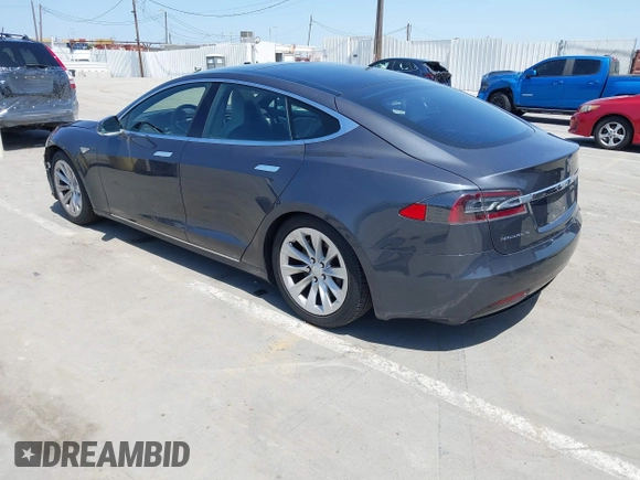 2016 Tesla Model S 90D with VIN 5YJSA1E22GF138236, listed as a IAAI auction lot 42532245 with 72,839 mi miles and . Bid and sale history available at DreamBid. Image 3.